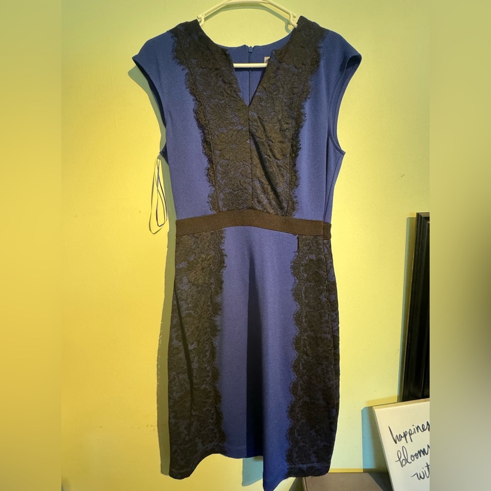 Danny and Nicole dress deep blue color with black lace trim.